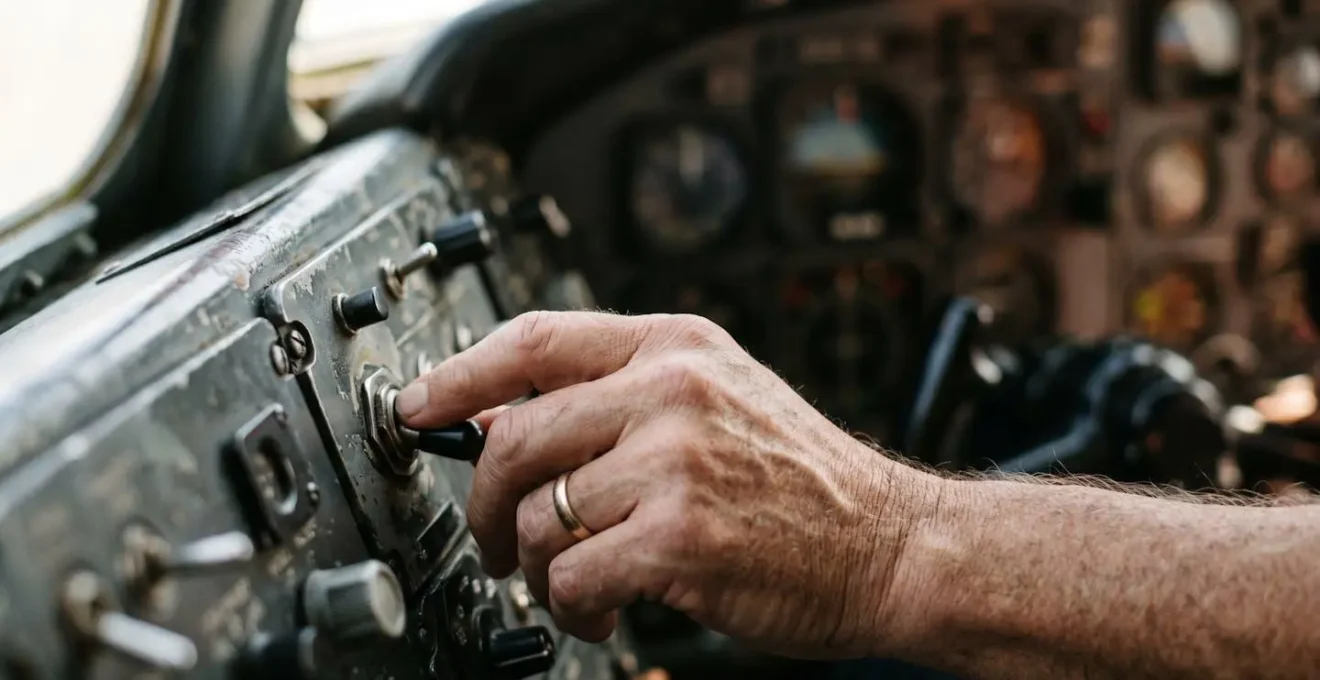 Conceptual representation of a hand carefully adjusting a toggle switch on a control panel, symbolizing the precise control offered by feature flags.