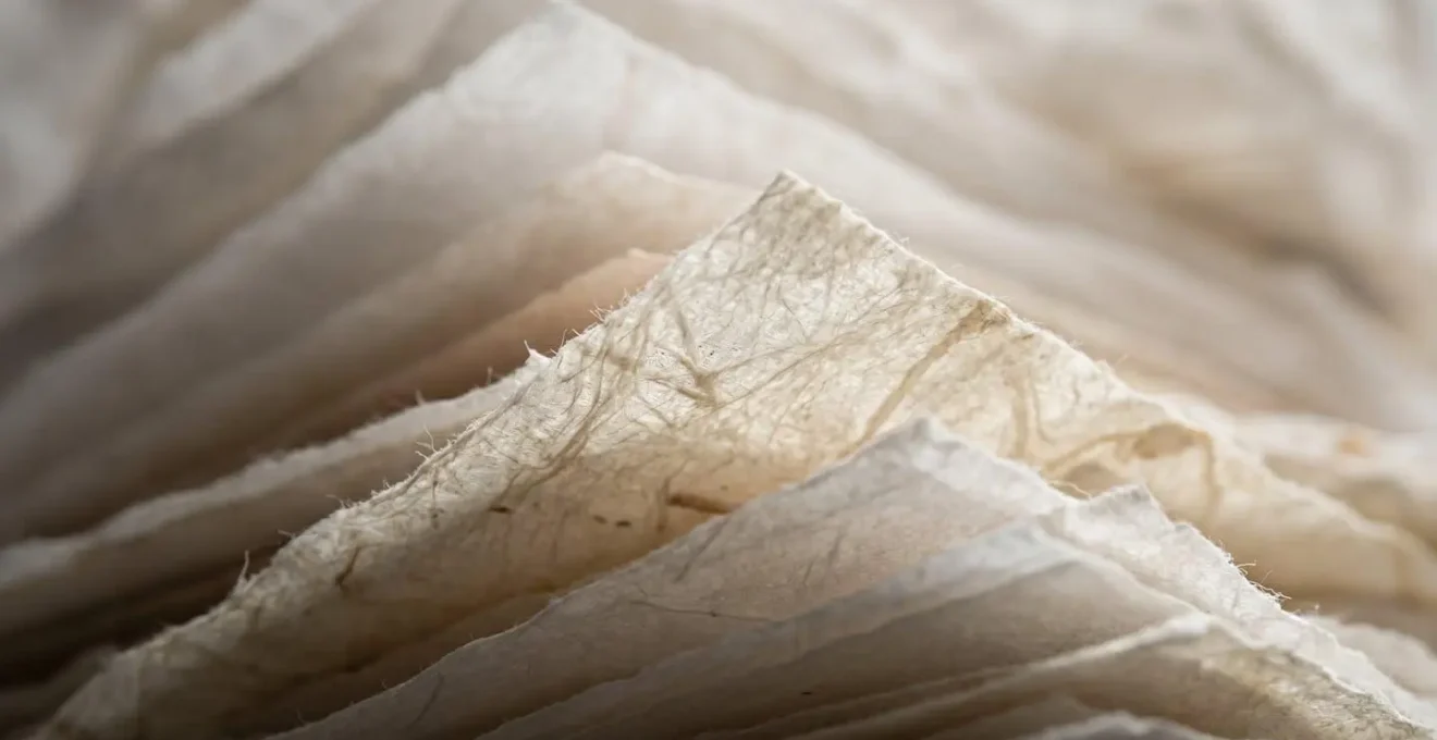 Macro detail of layered legal documents representing the complex tax and regulatory obligations triggered by remote work