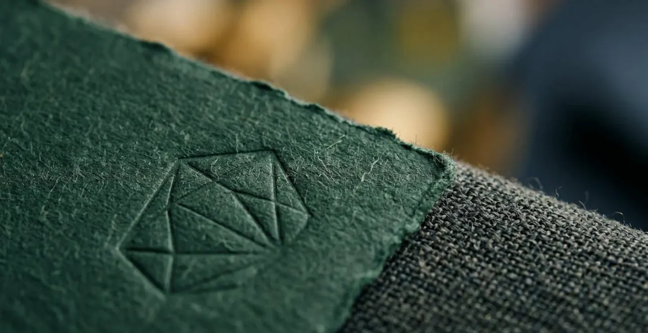 Extreme close-up detail of premium business materials showing quality and personalization craftsmanship